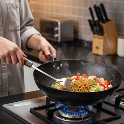 wok acier carbone noir